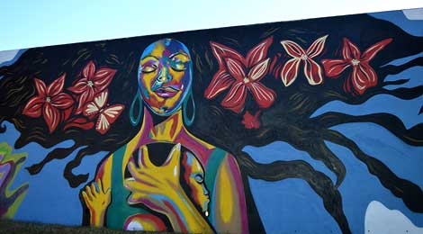 Mother and child, Pittman Park mural by Corey Barksdale