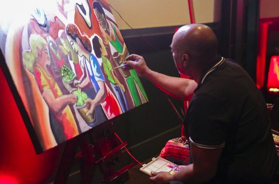 Detail of Atlanta live artist Corey Barksdale's painting for The Salvation Army, close on the painted figures